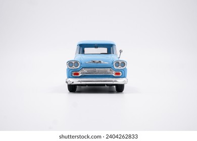 retro blue green pickup with moon hubcaps Stock Photo