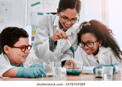 Science, teacher and students in classroom with slime for experiment, education and happy kid. Chemistry, boy child and girl at school for research, solution and development or results for project 库存照片