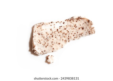 Sample of natural scrub isolated on white background. Peeling cream with microcapsules. Peach or coffee scrub smear. Stockfotó