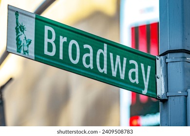 A sign indicating the famous Broadway street which is part of a district of Manhattan, in the Big Apple of New York (USA). – Ảnh có sẵn