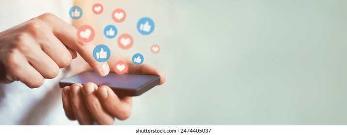 Social media and digital online communication concept, man using smartphone with likes icons on social media. Banner background. - Φωτογραφία στοκ