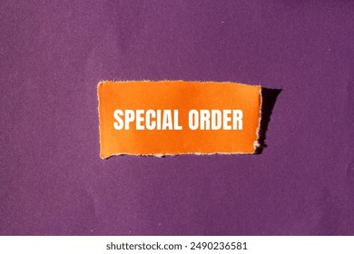 Special order message written on ripped torn orange paper piece with purple background. Conceptual special order symbol. Copy space. 库存照片
