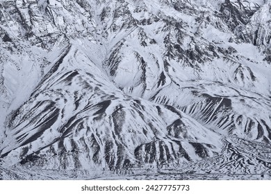Spiti Valley in India, snow winter. Himalaya mountain range, aerial view on the hill, Ladakh in India. Asia mountain Himalayas, blue winter landscape with rocky hill a snow range. Wild nature India.  Foto stock