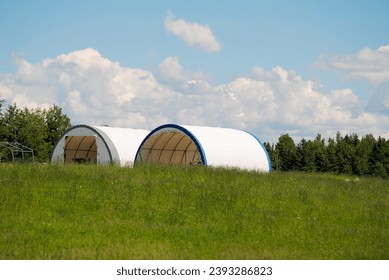 Storage Shelters in the Middle if a Meadow	 ภาพถ่ายสต็อก