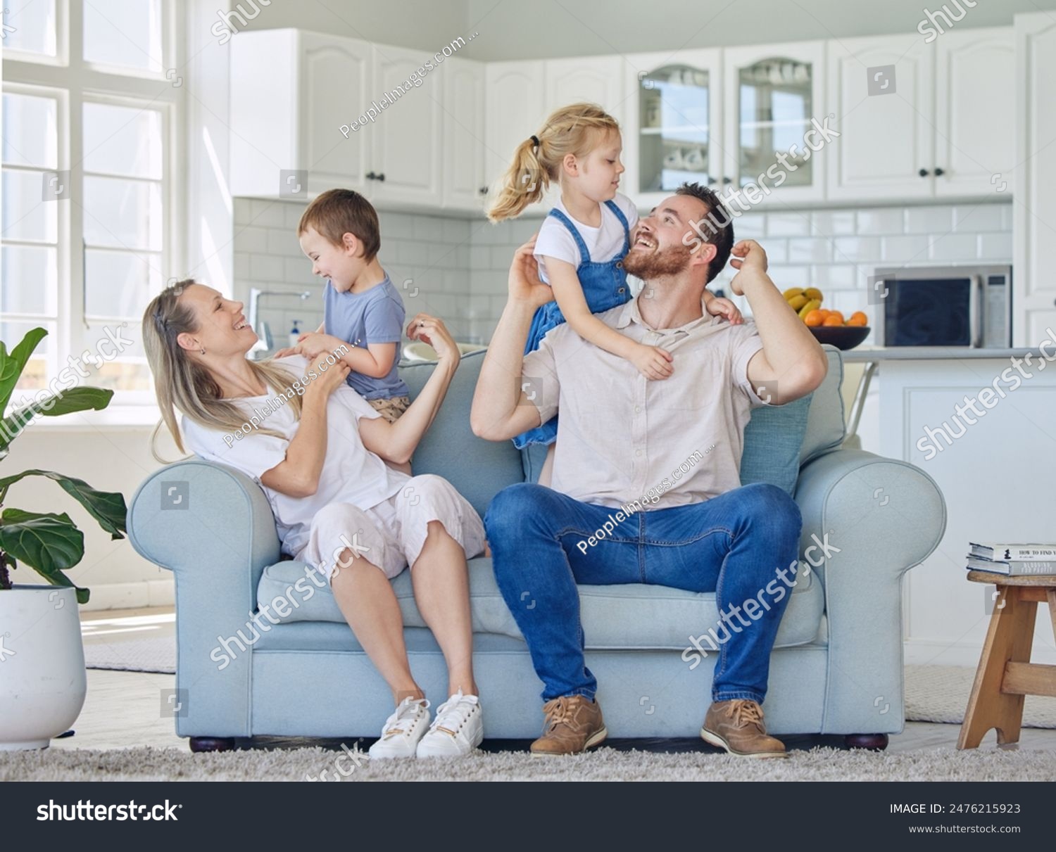 Fun, smile and family relax on sofa house for bonding, love and care or hug in living room together. Happy, woman and man with children for childhood, support and trust of memory at home break