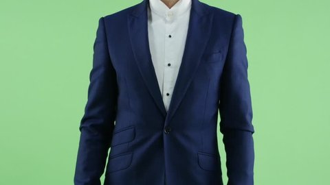 Business Man on Green Screen shows popup menu on the right 스톡 비디오