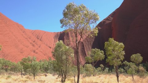 YULARA / AUSTRALIA - CIRCA 2010s: Various point of view POV close ups of Uluru / Ayers Rock in the Northern territory. - Βίντεο στοκ editorial