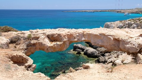  Video of  Arch of Korakas (Kamara tou Koraka), the most impressive natural bridge of Cyprus, located in the northeast coast of Cape Greko Cyprus  Video de stock