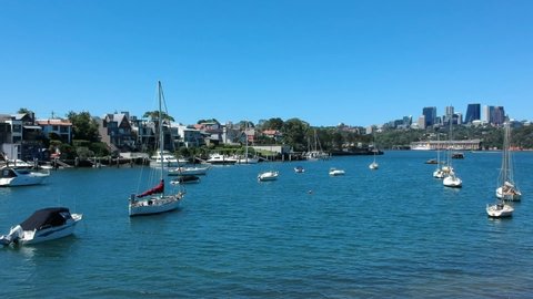 Panoramic Drone Aerial view of Sydney Harbour Yachts Boats houses and the bridge NSW Australiaの動画素材
