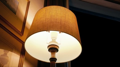 Lamp By Window Turned On And Off At Nightの動画素材
