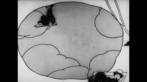 CIRCA 1919 - In this animated film, Charlie Chaplin dreams of riding a flying carpet from a Turkish rug shop.: redactionele stockvideo