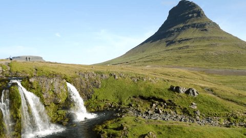 Kirkjufell mountain and waterfall in the snaefellsnes peninsula, during summer. High quality 4k footage Arkistovideo