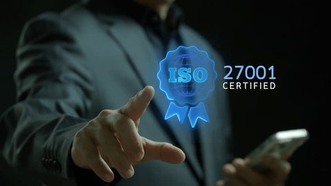 ISO 27001 concept. Requirements, certification, management, standards. Businessman showing identity proofing inside target icon with ISO 27001 for information security management system (ISMS). స్టాక్ వీడియో