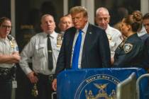 Former President Donald Trump walks outside of Manhattan Criminal Court after a jury convicted ...