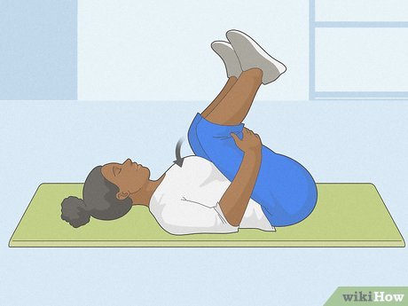 Step 4 Drop your hips and grab your knees for a more involved stretch.