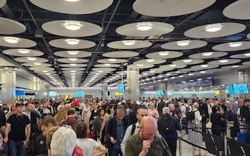 Long queues at the UK Border checkpoint, following a glitch in the electronic gate system, at London Heathrow Airport, in London