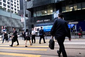 HONG-KONG, CHINA - FEBRUARY 27: Managers go to work in the Central area in the financial center on February 27, 2018 in Hong-Kong, China. Hong-Kong is the third largest financial centre in the world and the Hong-Kong stock exchange is only losing importance to those in London and New York.