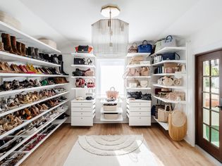 Shoes and bags stored in a walk-in closet