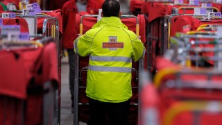 Royal Mail made a £348 million operating loss for the year to the end of March, though other parts of the group fared better