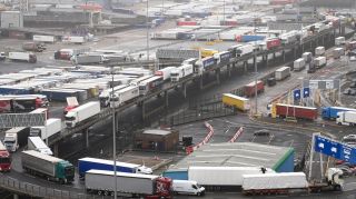 Lorries queue for ferries at Dover. A digital programme to reduce friction at crossings has fallen several months behind schedule