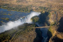 Victoria Falls: The bridge over the Zambezi River at Victoria Falls separates the countries of Zimbabwe and Zambia
