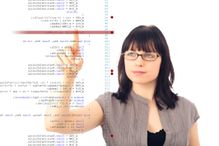 Woman-coding-nullplus-E-Plus-Getty-Images-154967519.jpg