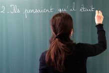 Teacher writing French