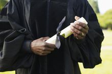 Woman holding a diploma