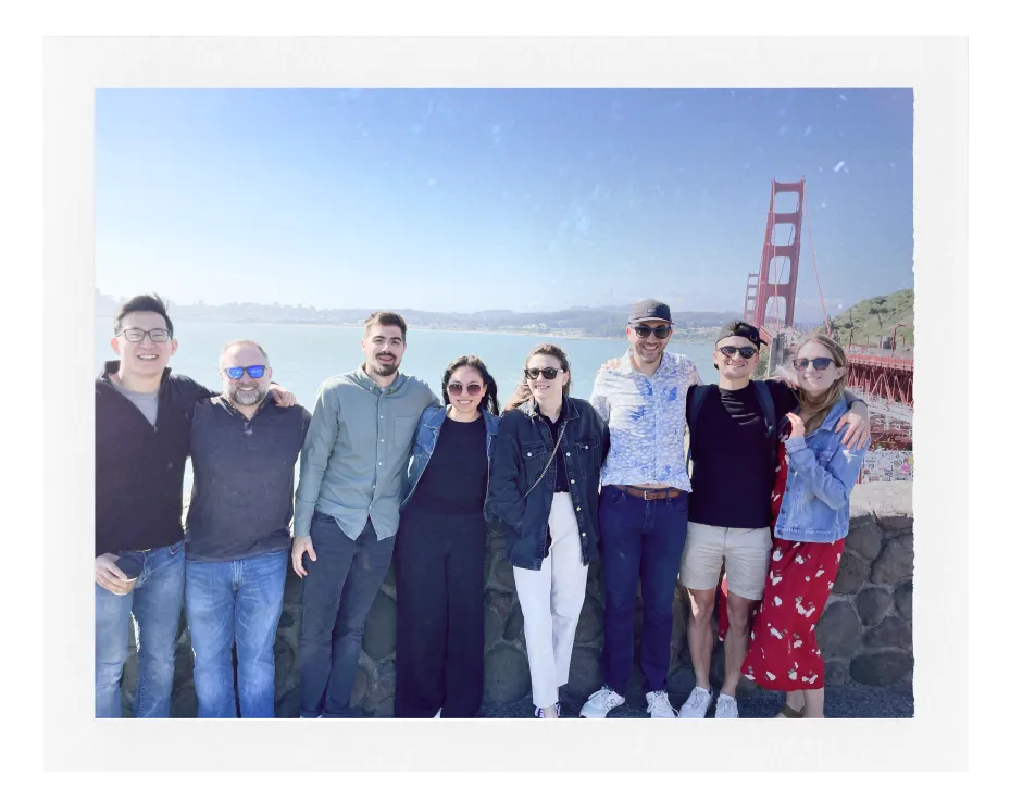 A photo of some members of the Scribe team in front of the Golden Gate Bridge in San Francisco.