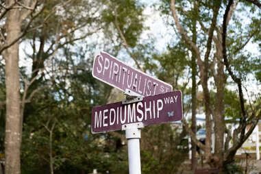 street signs reading "spiritualist street" and "mediumship way"