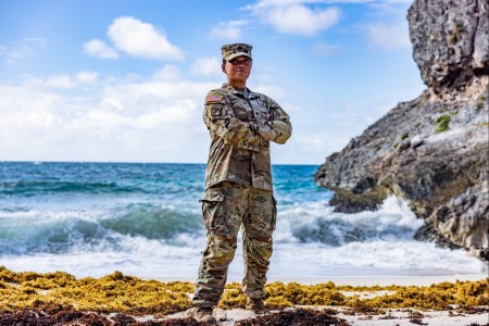 Staff Sgt. Sabrina Vimoto, platoon sergeant with the Signal Detachment, Group Support Battalion, 7th Group Special Forces Group, poses for a photo at Paragon Base, Barbados, May 2, 2024. While at exercise TRADEWINDS 24, Vimoto reflected on her heritage, her experience as an Army child, the tragedy of losing a sibling in combat and as a Soldier who served under her father’s leadership.