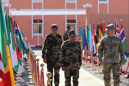 Moroccan Royal Armed Forces Maj. Gen. Mohammed Benlouali, Morocco Southern Zone commanding general, front left, and U.S. Army Maj. Gen. Todd R. Wasmund, U.S. Army Southern European Task Force, Africa (SETAF-AF), commanding general, right, lead the Moroccan opening ceremony of exercise African Lion 2024 (AL24) in Agadir, Morocco, May 20, 2024. African Lion 2024 marks the 20th anniversary of U.S. Africa Command’s premier joint exercise led by U.S. Army Southern European Task Force, Africa, running from April 19 to May 31 across Ghana, Morocco, Senegal and Tunisia, with over 8,100 participants from 27 nations and NATO contingents. (This photo has been altered for security purposes by blurring out an identification badge.)