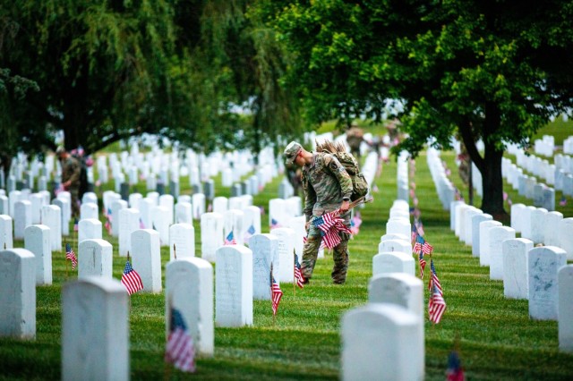 Soldiers from the 3d U.S. Infantry Regiment (The Old Guard), along with service members from across the Armed Forces, place 260,000 American flags at headstones within Arlington National Cemetery, Va., May 25, 2023. The Old Guard has the distinction of being the ceremonial unit who places the flags at every headstone and niche for the past 55 years. Every year, over a thousand Old Guard Soldiers, place small American flags as a way to connect with their heroes as the unit represents the U.S. Army to the nation and the world.
