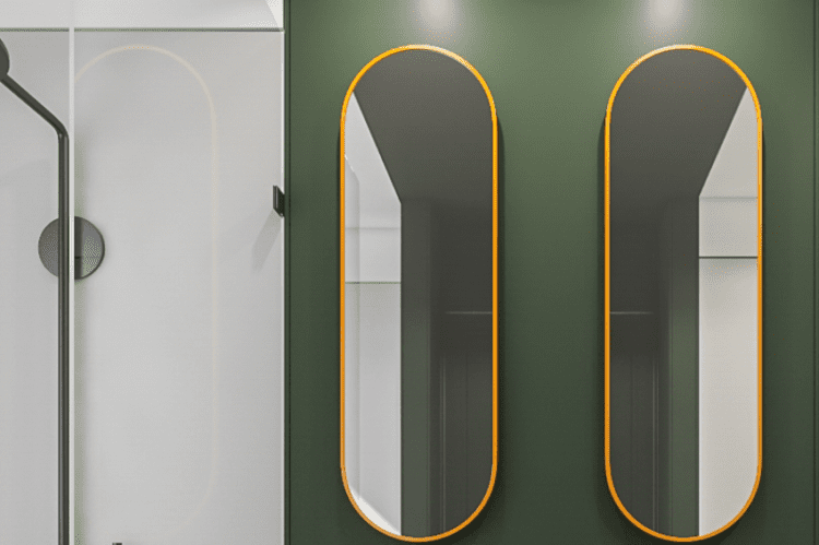 A modern green and gray bathroom featuring sleek mirrors with orange accents, a hallmark of ArchiBuilders' bathroom renovations in Brooklyn.