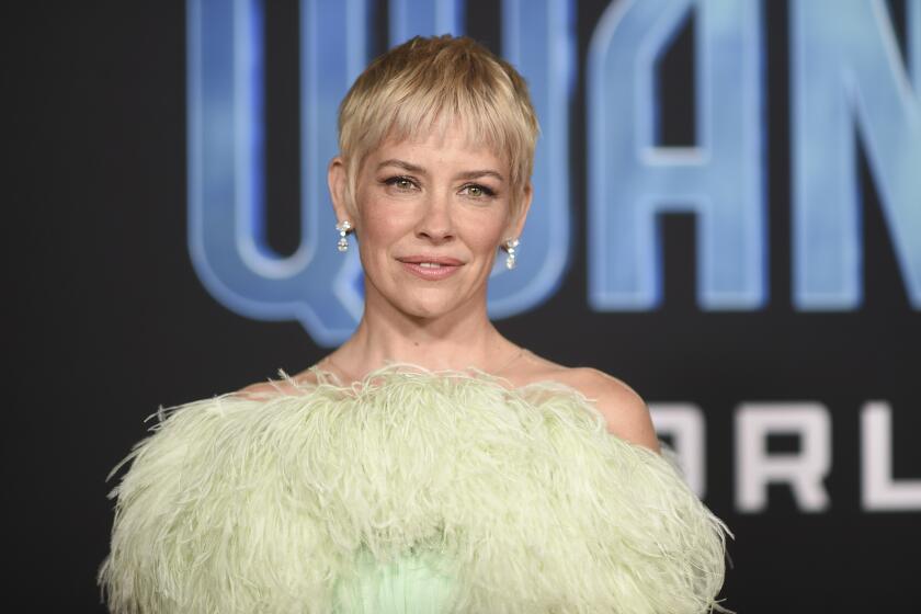 Evangeline Lilly, in lime green strapless gown, at the premiere of "Ant-Man and the Wasp: Quantumania" in 2023