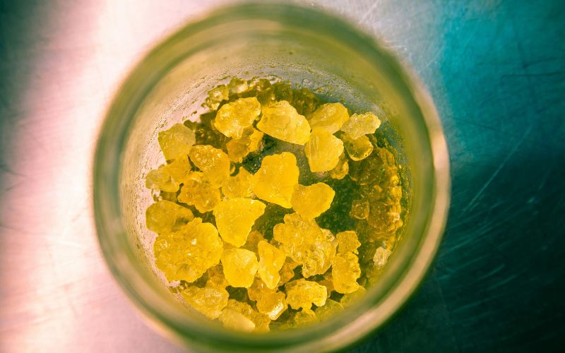 Cannabis extracts in an open glass container