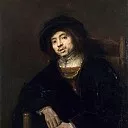 Portrait of a young man in an armchair, Rembrandt Harmenszoon Van Rijn