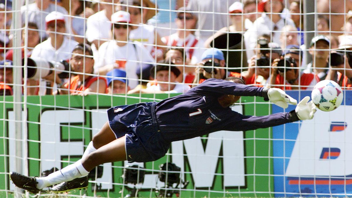 Goalie Briana Scurry of the US team blocks a penal