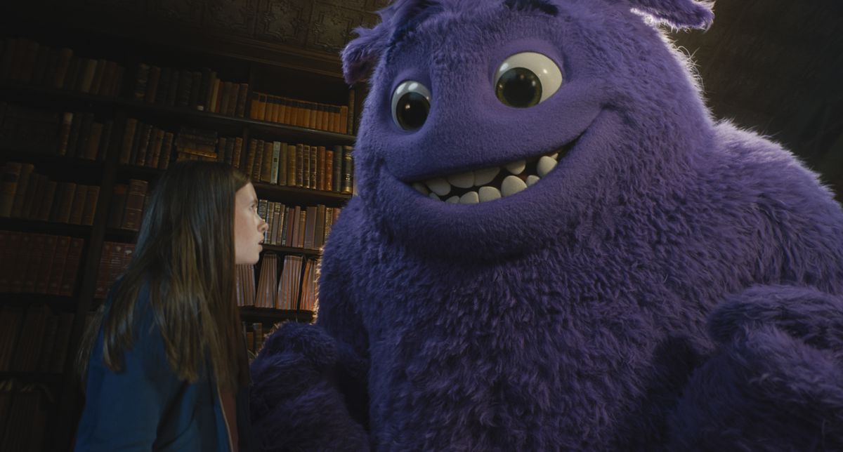 Cailey Fleming looks up at a giant purple monster in IF, the movie about an imaginary friend.