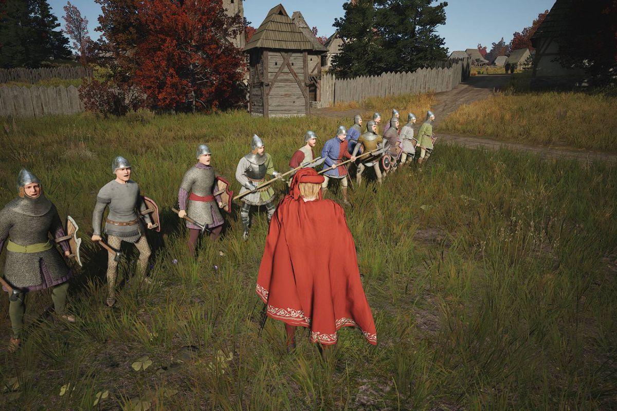 A Manor Lords leader stands in front of a retinue in a field.