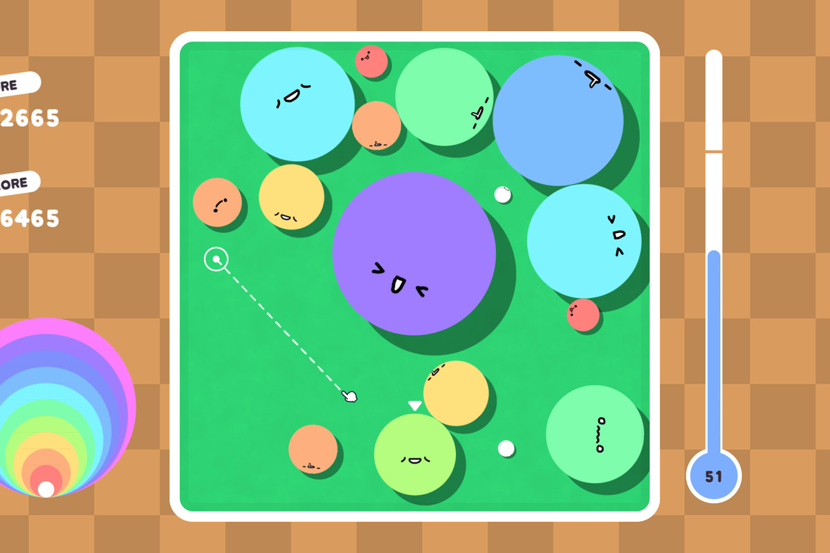 A screenshot from POOOOL, showing a whole bunch of colorful balls inside a box. They’re cute and have faces.