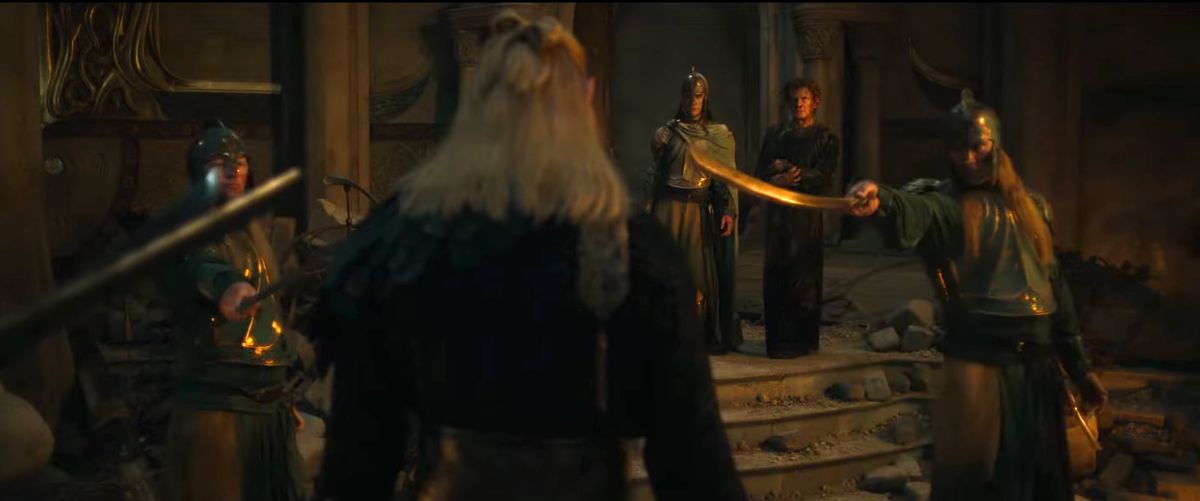 Elven guards point their swords at Sauron, seemingly protecting a ragged-looking Celebrimbor from him in the trailer for season 2 of The Lord of the Rings: The Rings of Power