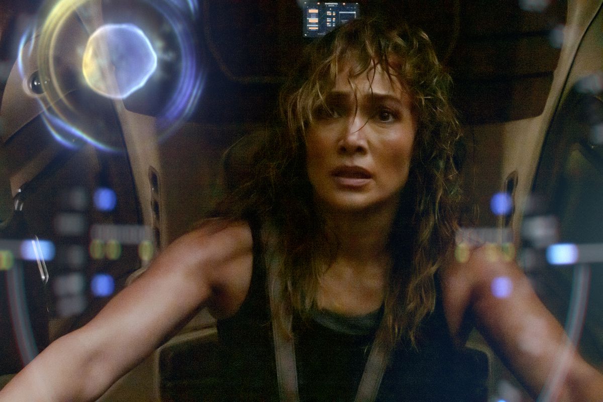Jennifer Lopez looks concerned in the cockpit of a mech in Atlas.