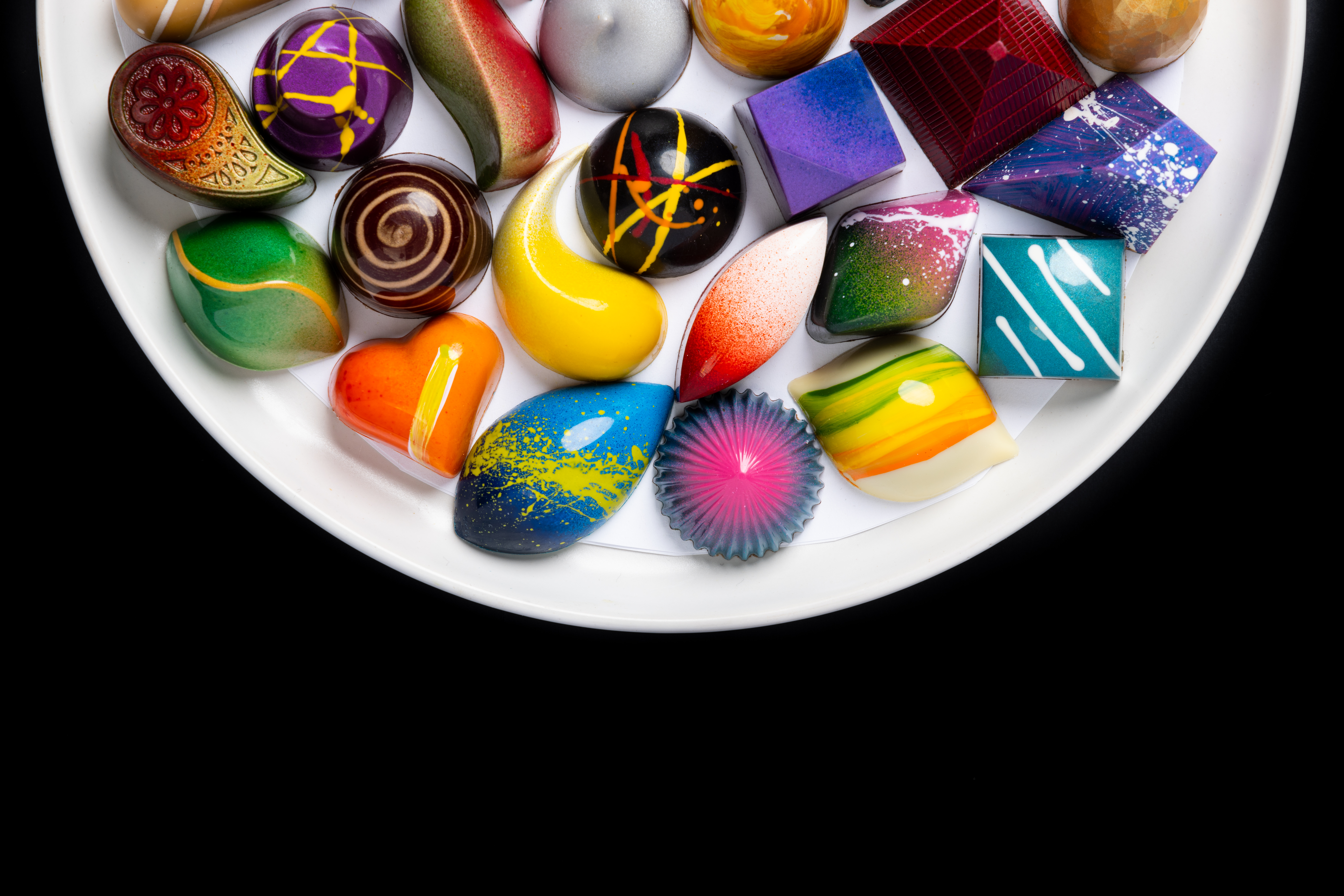 An image of painted chocolates