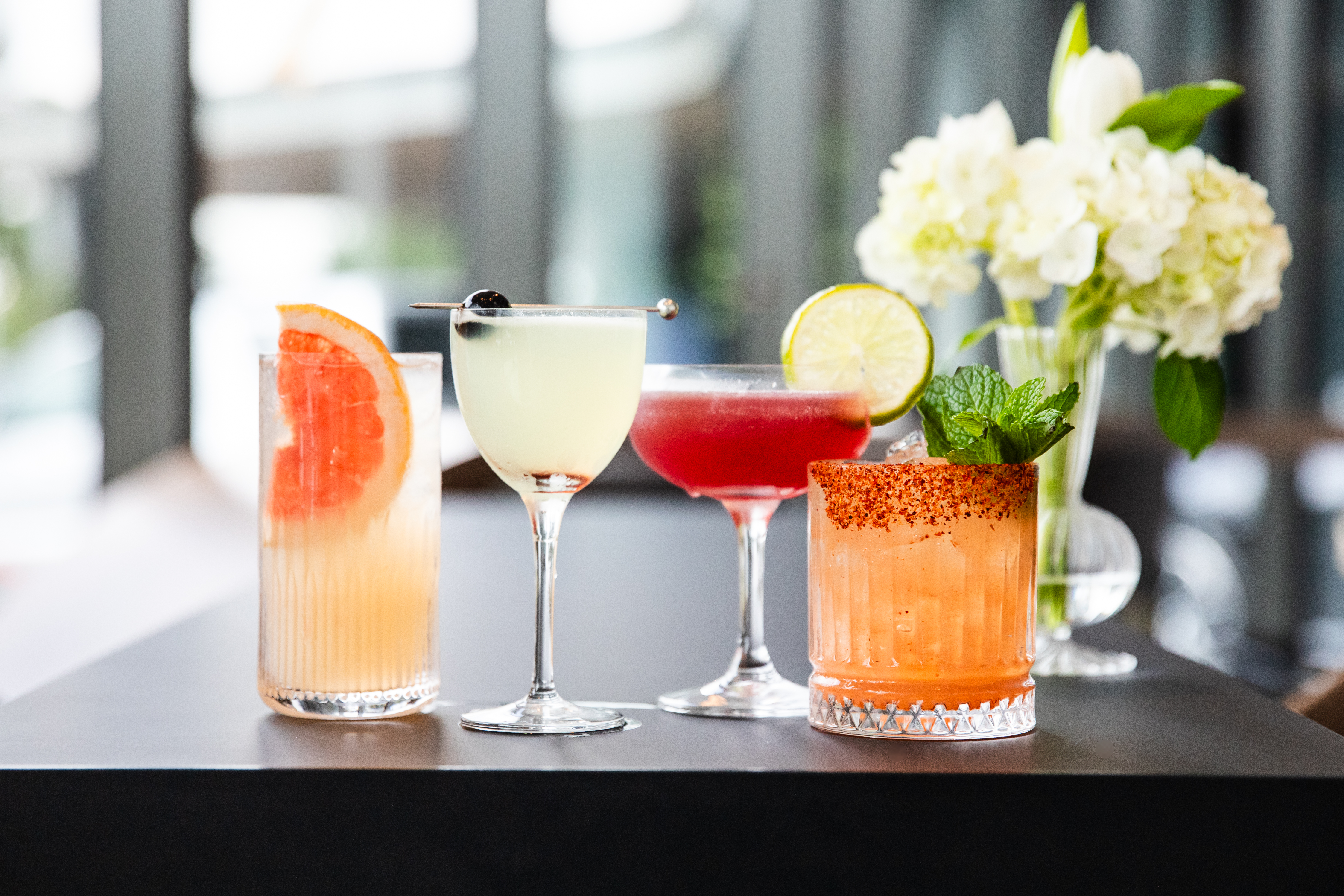 An image of four cocktails.