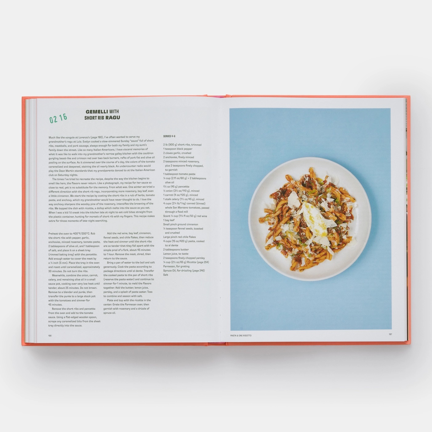 A cookbook opened to a recipe and photograph of a dish.