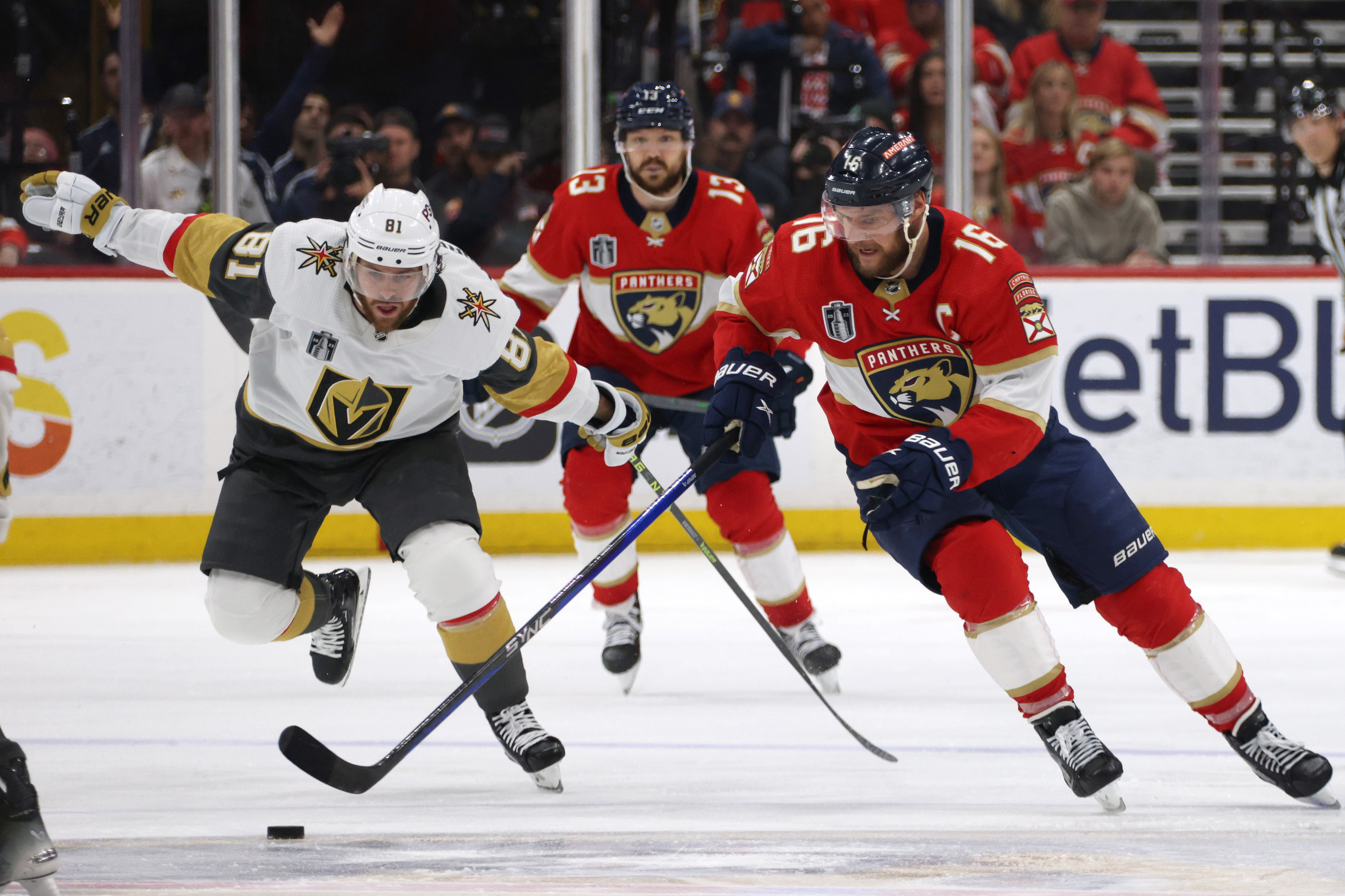 Jonathan Marchessault of the Vegas Golden Knights is off balance chasing Aleksander Barkov of the Florida Panthers during the second period of Game Four of the 2023 NHL Stanley Cup Final at FLA Live Arena on June 10, 2023 in Sunrise, Florida.