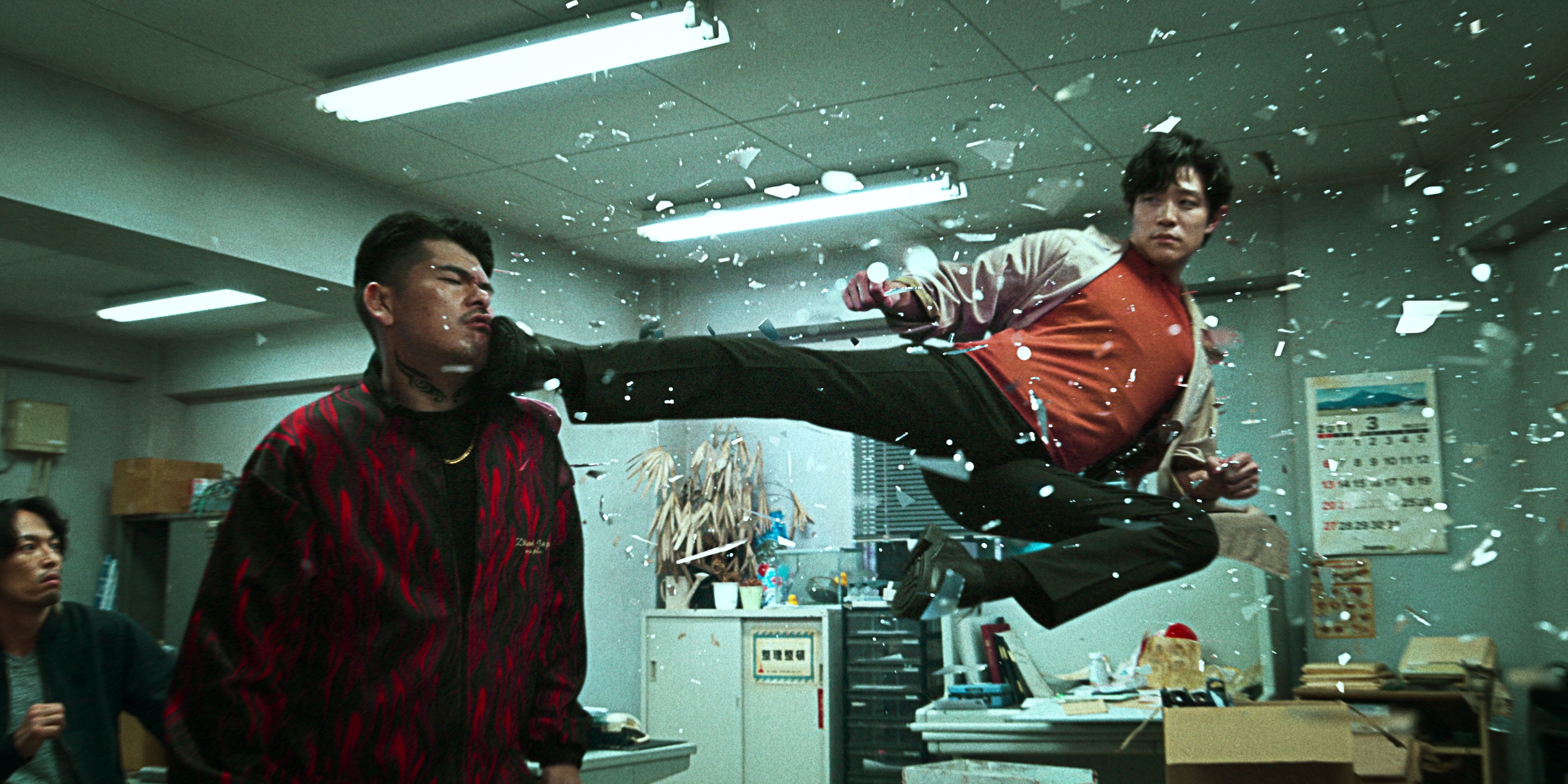 Ryohei Suzuki delivers a flying kick to a man’s face in City Hunter