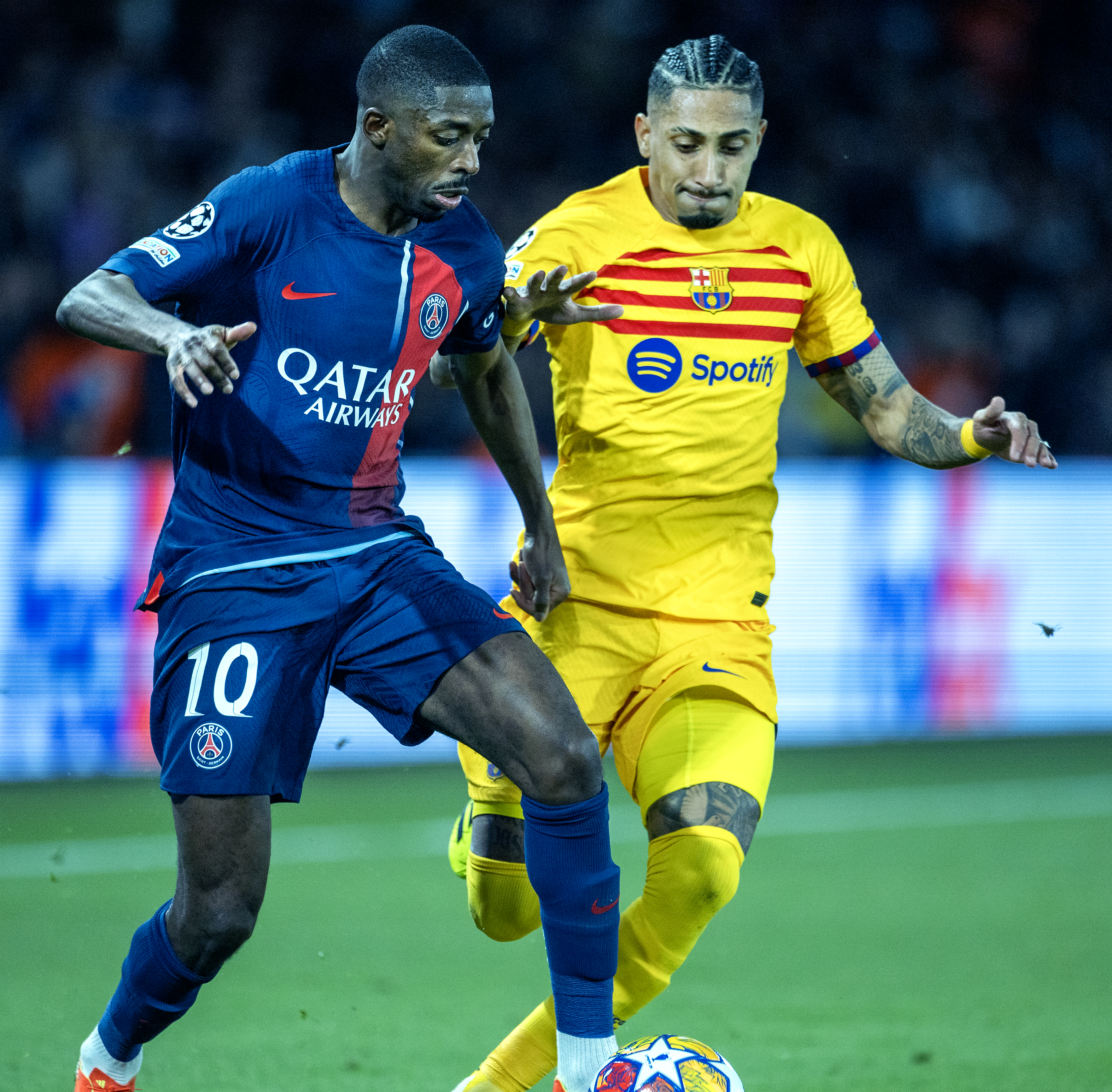 Ousmane Dembélé defended by Raphinha - FC Barcelona v Paris Saint-Germain - UEFA Champions League Quarterfinal second leg