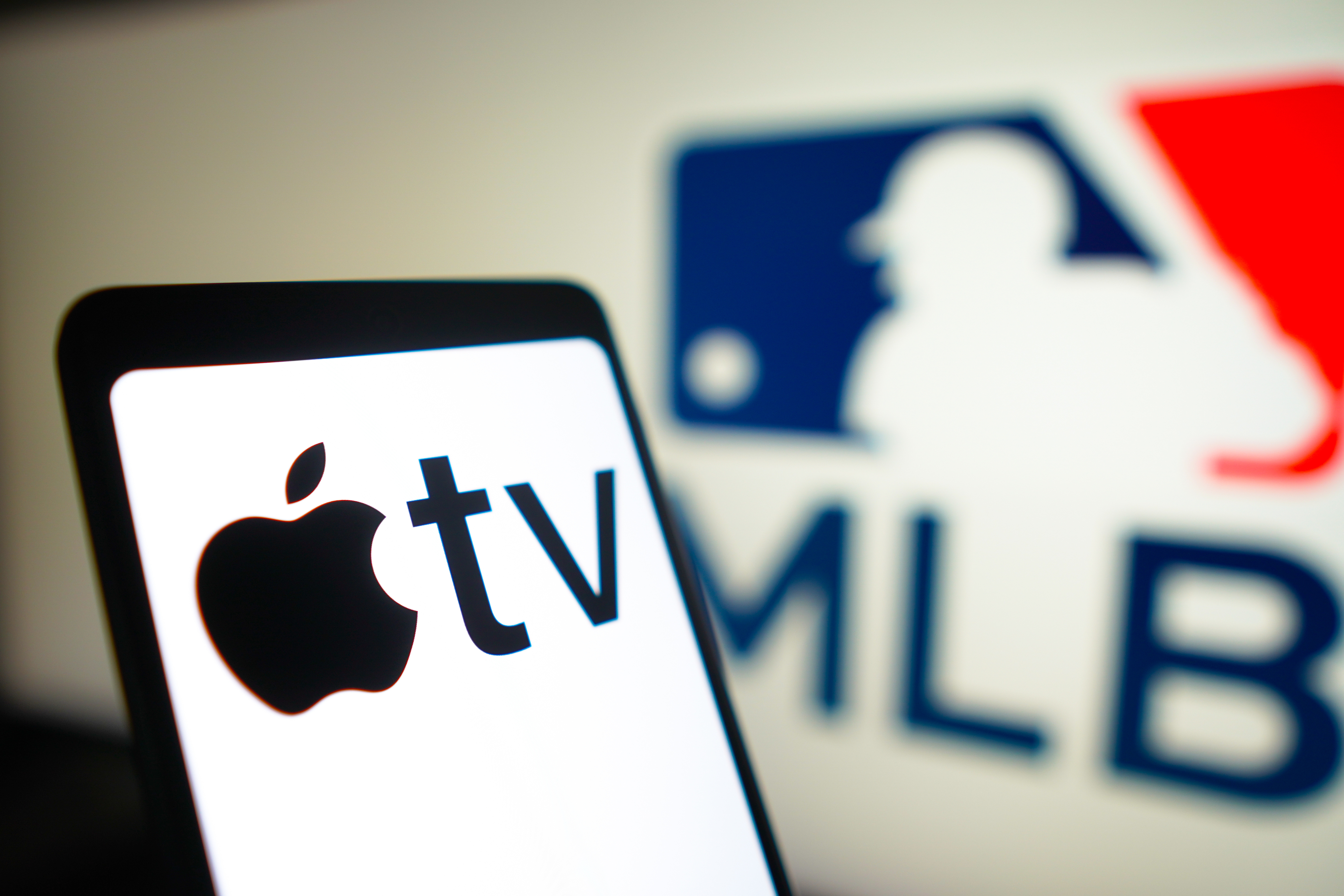 In this photo illustration, the Apple TV logo is displayed...
